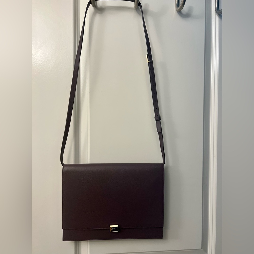 Smythson Grosvenor leather iPad clutch in eggplant color